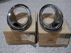 66 67 C2 Corvette Lh/rh Exhaust Bezels--gm #3892225/3892226--NOS New. Price: $299.95.