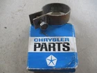 Mopar Exhaust Clamp - Nos 1960'S P/n 2240311 New. Price: $9.95.